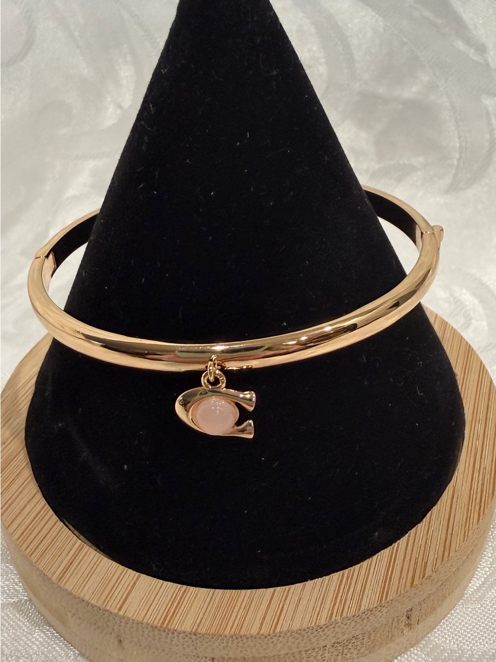 Coach Gold-Tone Bangle Bracelet with Pink C Charm. New.size 6.75